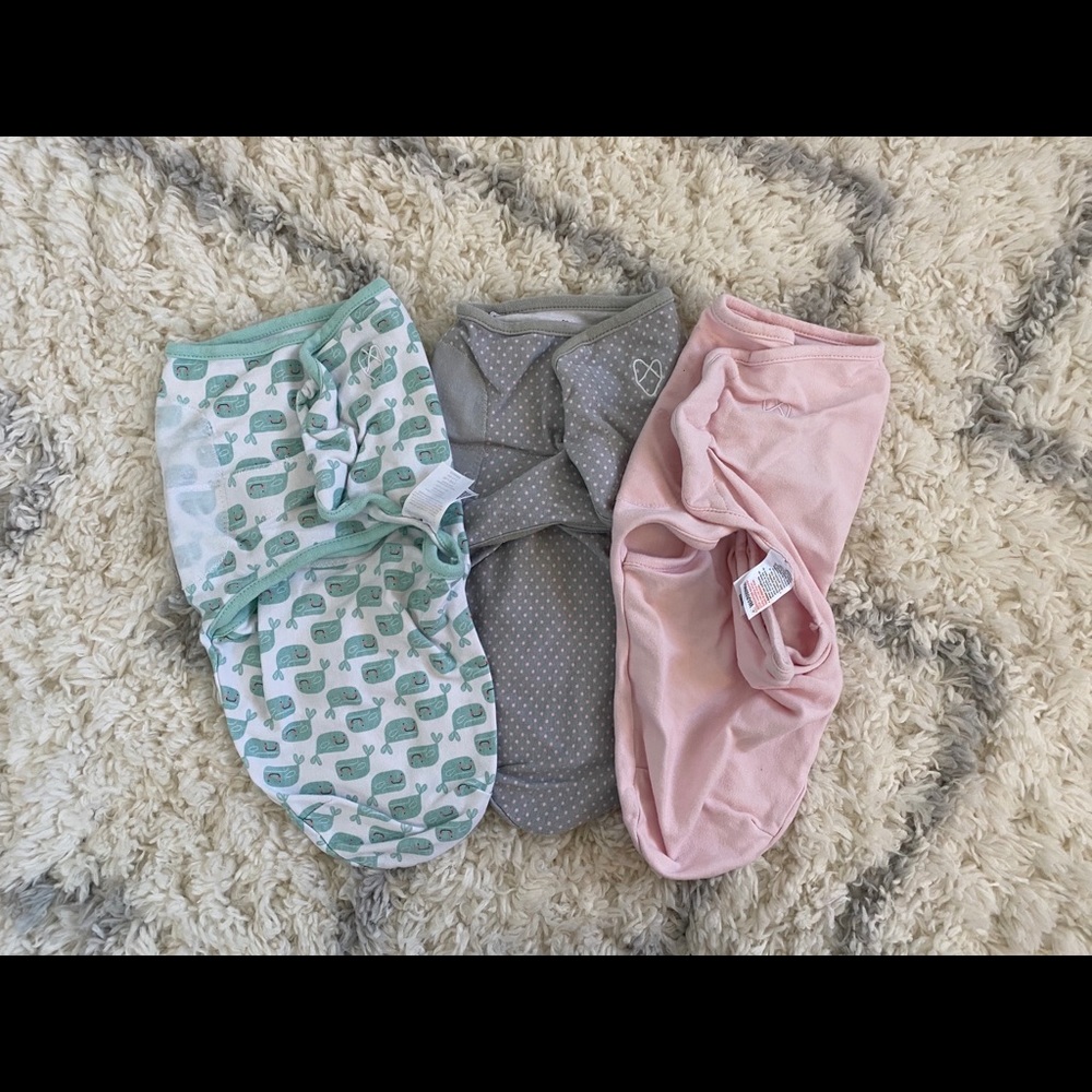Three SwaddleMe swaddles